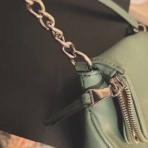 Dana Buchman crossbody. Lots of storage. Excellent like new condition Free Ship